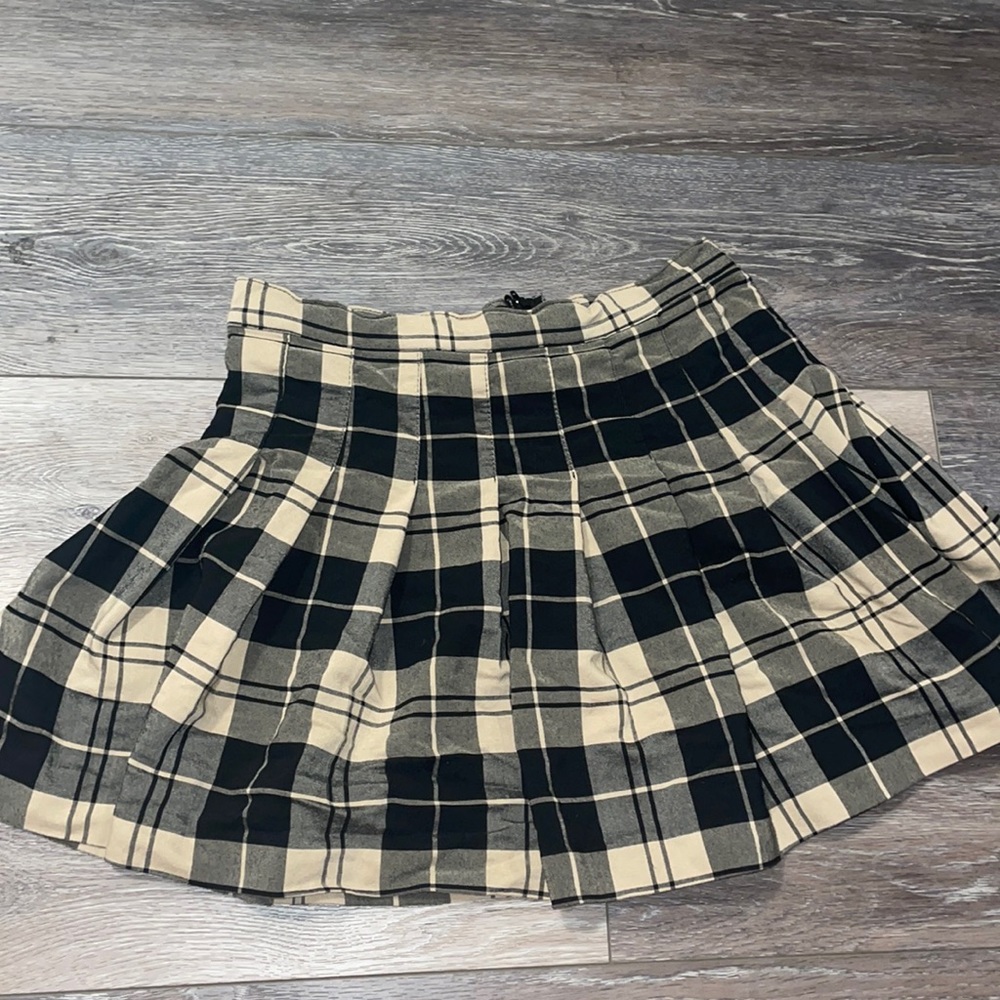 Mini plaid tan and black skirt